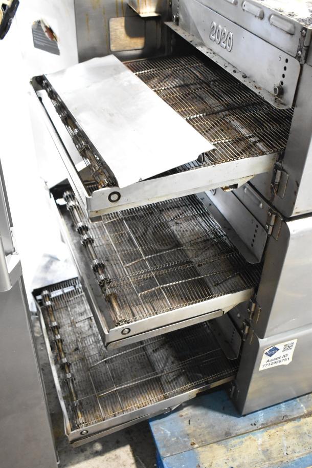 Turbochef HhC2020 stainless steel commercial conveyor oven. Features 3 stainless racks, electric, 208/240 volts, 3 phase.