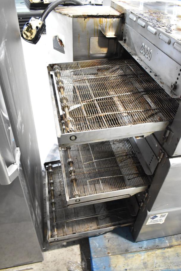 Three 2017 Turbochef HhC2020 stainless steel rapid cook conveyor ovens, showing internal conveyor belts, in used condition.