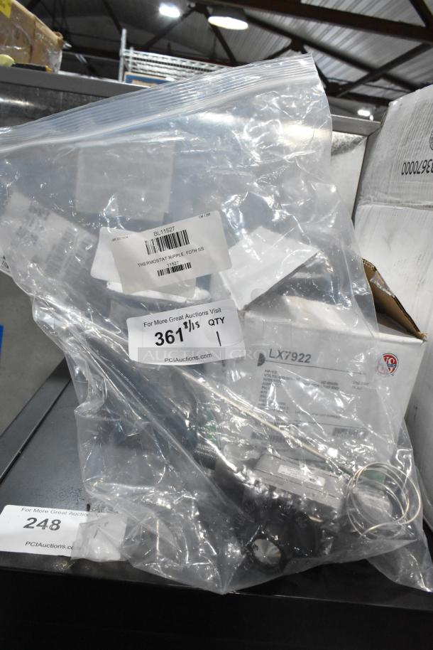 Brand new Blodgett 11527 thermostat in bag, labeled "SCRATCH AND DENT," with minor packaging damage, model BL11527.