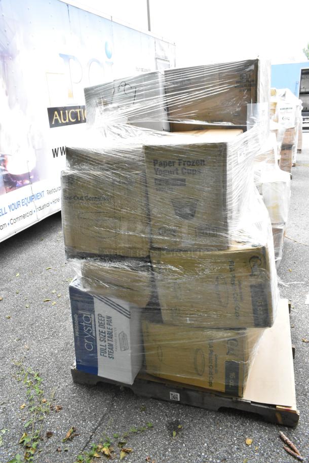 Pallet with 20 scratch and dent items including cups, plates, and towels, wrapped in plastic. Boxes labeled "Paper Frozen Yogurt Cups."