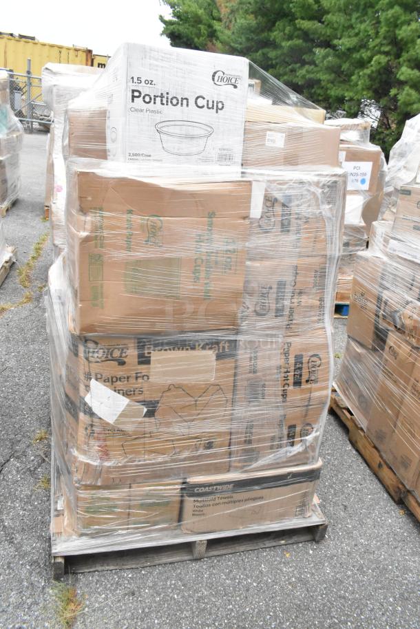 Pallet of scratch and dent items including towels, cups, containers, and bags. Boxes marked "Portion Cup" and "Brown Kraft".