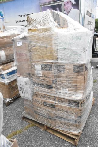 Pallet of 23 new scratch and dent items including portion cups, to-go containers, paper towels, and toilet paper, wrapped in plastic.