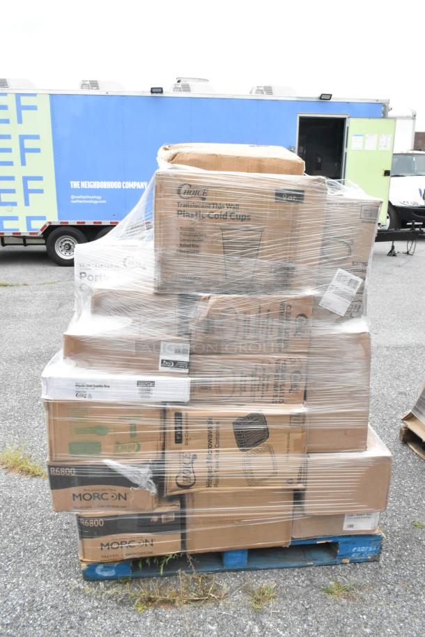 Pallet wrapped in plastic with boxes labeled "Choice Plastic Cold Cups" and "Morcon R6800." Scratch and dent items.