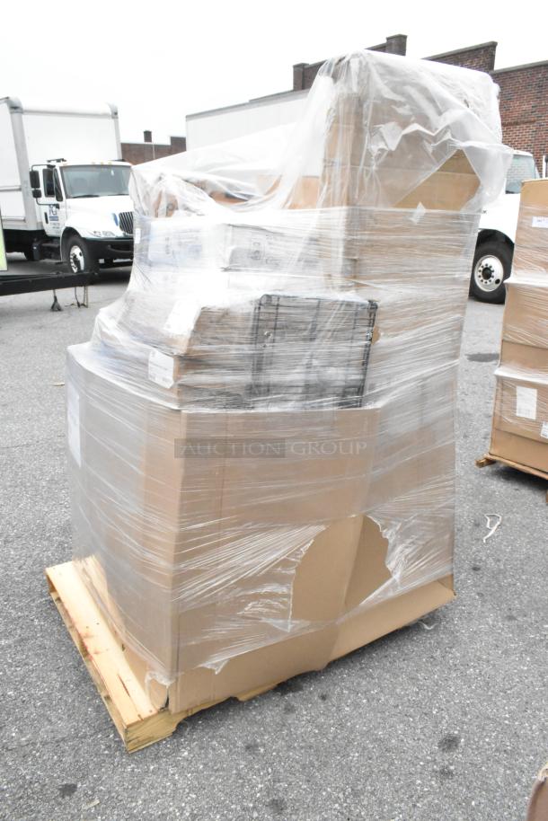 Plastic-wrapped pallet with 26 scratch and dent items, including register paper, hot cups, and ice bags, stacked in boxes.