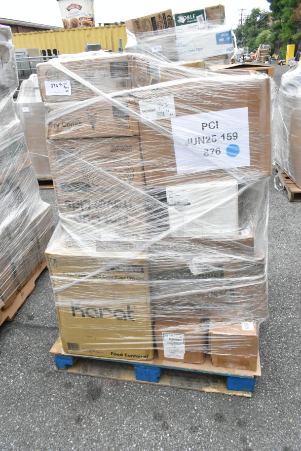Pallet with 28 new scratch and dent items: napkins, hot paper cups, white paper bags, wrapped in plastic, labels visible.