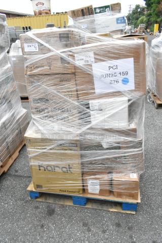 Pallet with 28 new scratch and dent items: napkins, hot paper cups, white paper bags, wrapped in plastic, labels visible.