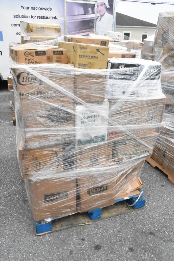 Pallet of assorted brand new scratch and dent items, including napkins, hot paper cups, and white paper bags, shrink-wrapped.
