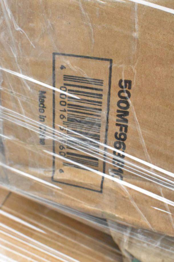 Cardboard box with barcode and "Made in USA" label. Contains new scratch and dent items: to-go containers, dome lids, plates.