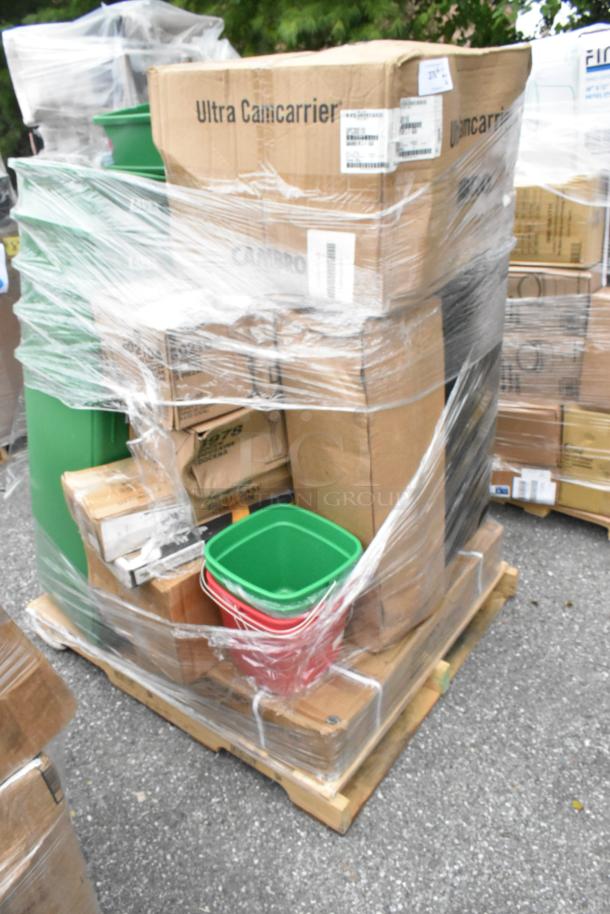 Pallet of mixed items including trash cans, martini glasses, cocktail shakers. Some boxes labeled "Ultra Camcarrier." Wrapped in plastic.