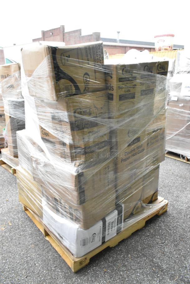 Pallet of 32 new scratch and dent boxes including dome lids, plates, deli containers, and teaspoons, wrapped in plastic.
