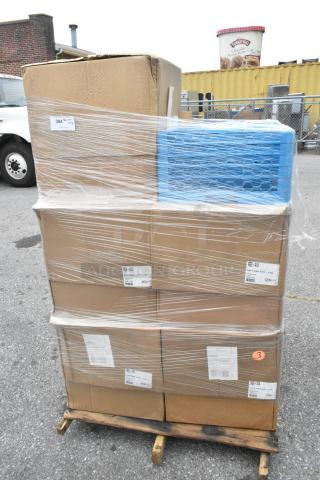 12 new Carlisle RG9-414 OptiClean glass racks with 4 extenders on a pallet, wrapped in plastic, labels visible.