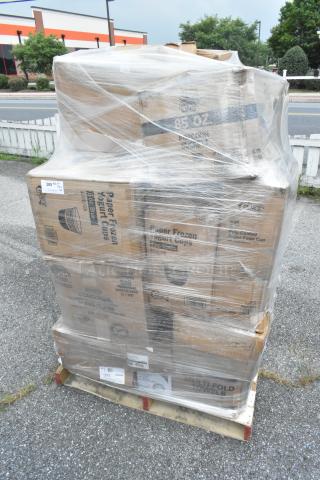 Wrapped pallet with assorted items including trash bags, food cups, and towels. Boxes labeled "Paper Frozen Yogurt Cups" and "Multi-Fold Towels."