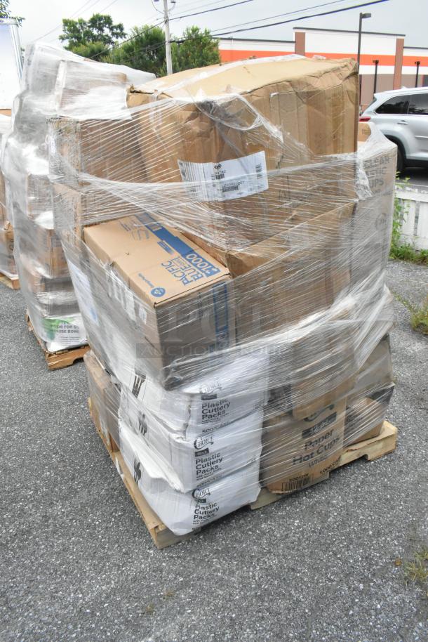 Pallet of boxed kitchen items wrapped in plastic, includes bowls, forks, cold cups, labeled "Scratch and Dent". 22 items.