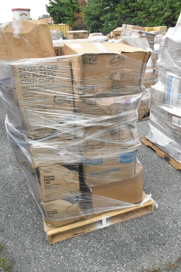 Pallet of 22 boxed items, including bowls, forks, and cold cups, wrapped in plastic, marked as scratch and dent.