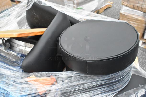 9 brand new scratch and dent items, including mobile mixing bowl cart and black stool cushions, wrapped in plastic.