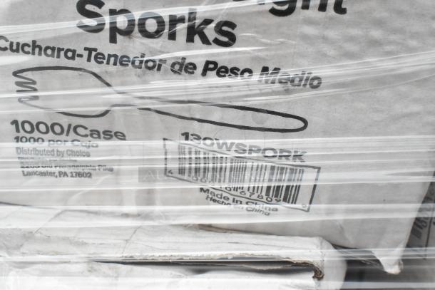 Boxes labeled "Sporks," 1000 per case, wrapped in plastic. Made in China, Lancaster, PA distributor. Slightly damaged packaging.