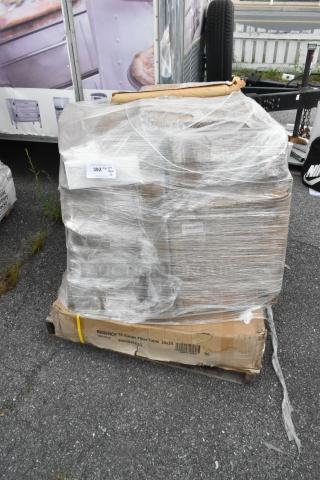 Shrink-wrapped pallet of 12 new scratch and dent items including glasses, shelves, dustpan. Regency label on box.