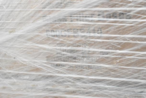 A pallet wrapped in plastic showing partially visible labels and markings, containing 12 scratch and dent items.