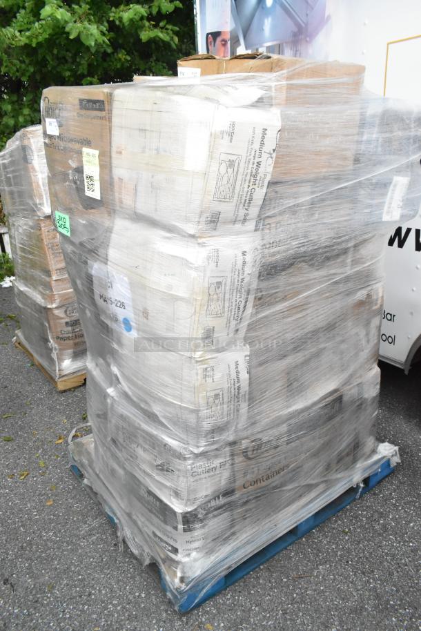 Plastic-wrapped pallet with 28 scratch and dent boxes of toilet paper, containers, and napkins. Boxes show product details.