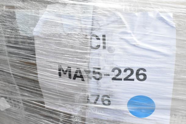 Pallet of brand new scratch and dent items wrapped in plastic, includes toilet paper, containers, napkins. Marked "MA5-226".