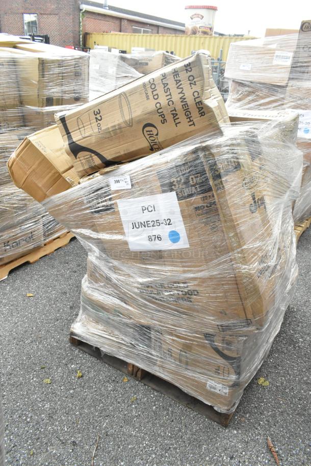 Shrink-wrapped pallet with scratch and dent boxes labeled "32 oz. clear plastic cups," "PCI," and "JUNE25-32 876."