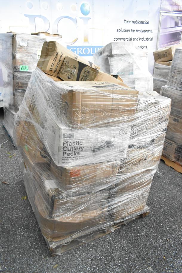 Pallet of 25 new scratch and dent items including plastic cutlery packs, deli wrap, and containers, wrapped in plastic.