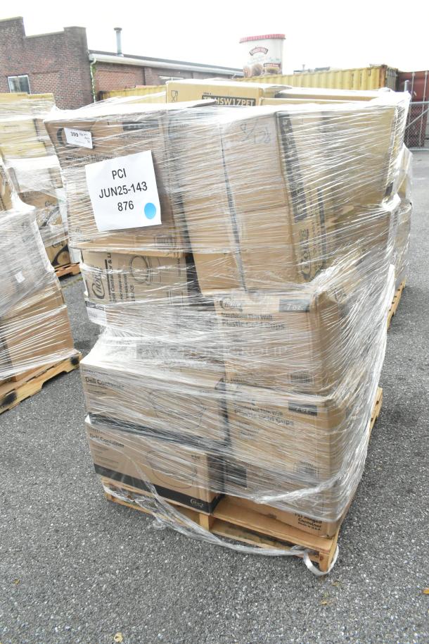 Shrink-wrapped pallet of new scratch and dent boxes labeled with PCI JUN25-143. Includes towels, napkins, containers, and cups.