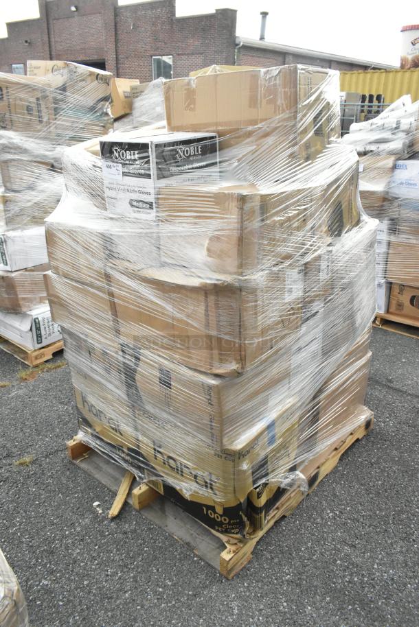 Plastic-wrapped pallet of 26 new scratch and dent items, including Noble gloves and Karat containers, visible in cardboard boxes.
