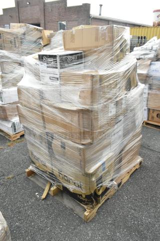 Plastic-wrapped pallet of 26 new scratch and dent items, including Noble gloves and Karat containers, visible in cardboard boxes.