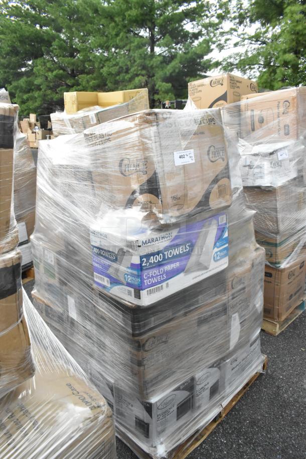 Pallet with assorted boxed kitchen items including towels, cold cups, pans. Brand new, some scratch and dent. Wrapped in plastic.