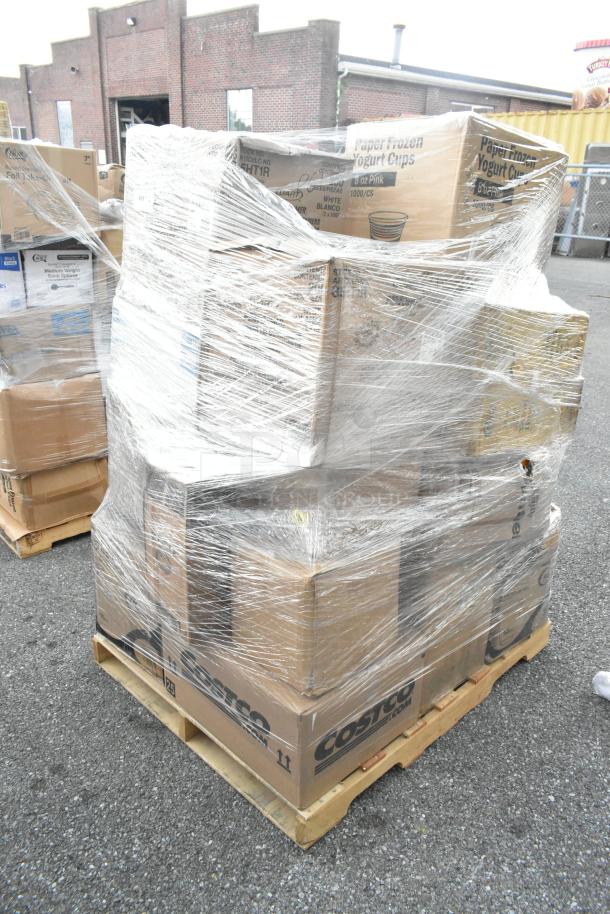 Pallet of 20 scratch and dent items wrapped in plastic, including cold cups, containers, towels, and bait blocks.