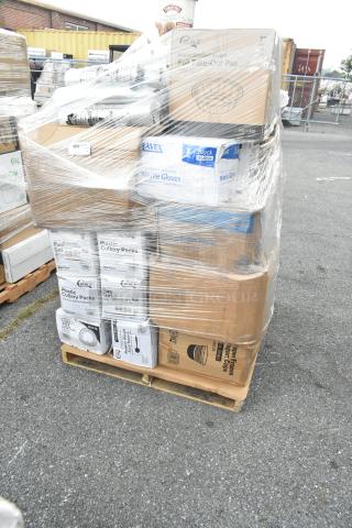A wrapped pallet with boxes of brand new scratch-and-dent items: trash bags, plates, hot cups, food bags, and nitrile gloves.