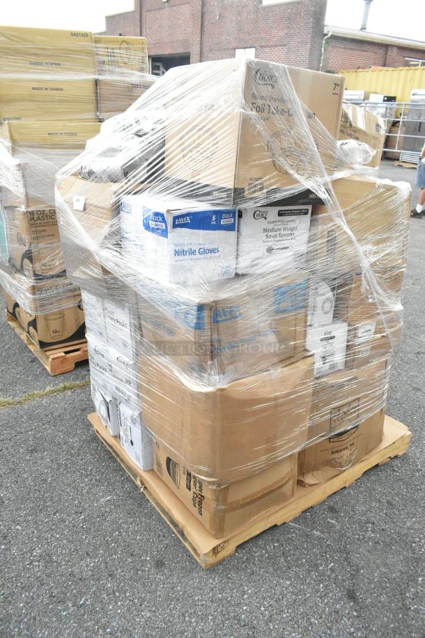 Pallet of 26 brand new scratch and dent items, including trash bags, plates, cups, and food bags, wrapped for auction.
