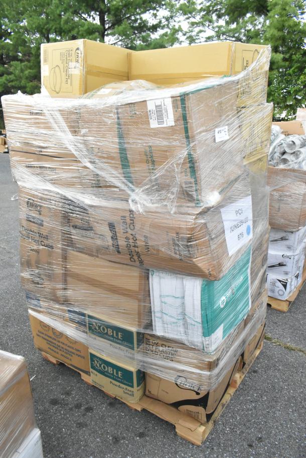 Pallet of assorted items including yogurt lids, food containers, deli containers, paper bags, and cold cups, shrink-wrapped.