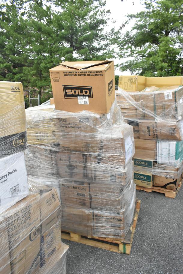 32 boxes of scratch and dent items on pallets, including Solo hot cups, Choice containers, and cutlery packs, wrapped in plastic.