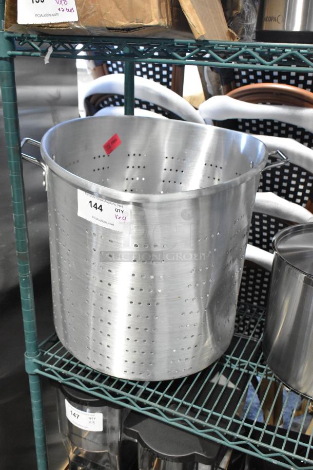 Set of four metal items: three stock pots and one colander/steam pot with handles, labeled "144, QTY x4" on a shelf.
