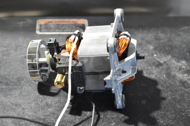 Bison 122485-00 motor, new scratch and dent, metal and copper, part of auction lot with Sloan EBV129A-C.
