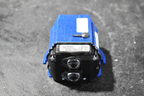 Brand new Sloan EBV129A-C electronic valve with visible label, indicating model and serial number, pristine condition.