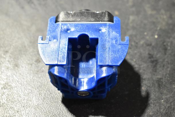 Blue plastic component, possibly a Bison 122485-00 or Sloan EBV129A-C. Appears new, minimal signs of wear or scratches.