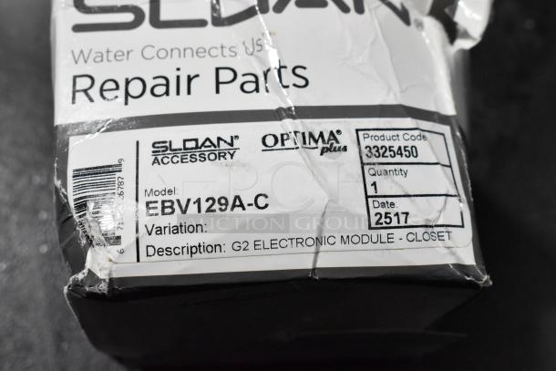 Sloan EBV129A-C Optima Plus electronic module in original packaging with visible wear, product code 3325450.