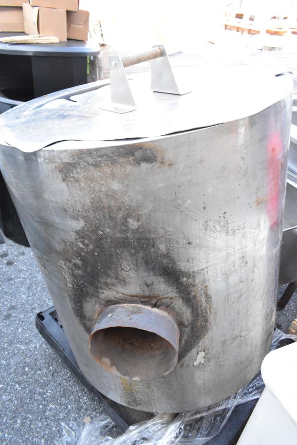 Stainless steel kettle with visible wear, discoloration, and rust. Suitable for industrial use. No visible branding or model markings.