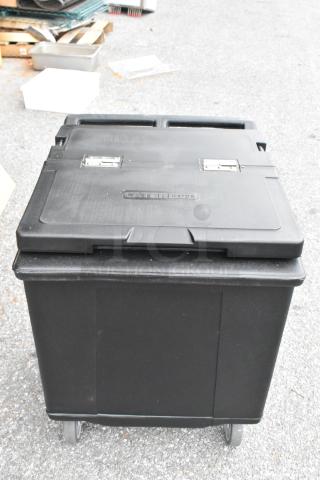 Brand new CaterGator 215IB125BK black mobile ice bin, 125 lb capacity, flip lid, minor scratches, mobile wheels.