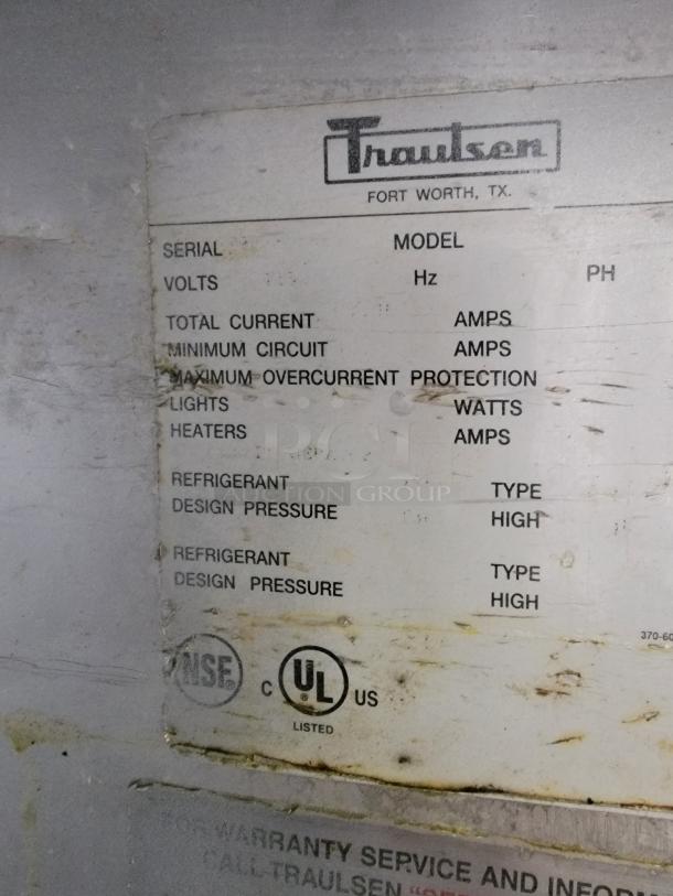 Traulsen G12000 commercial reach-in freezer label, showing electrical specifications and UL, NSF certifications.