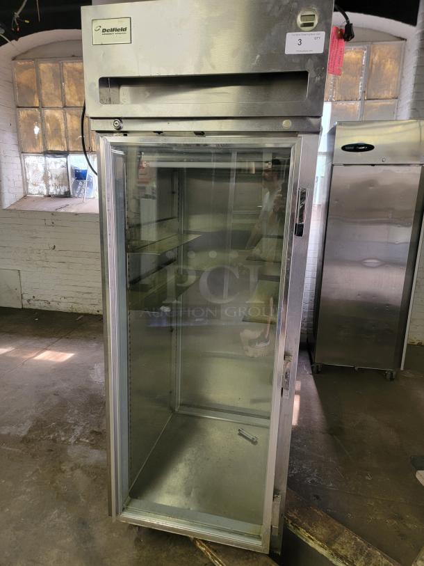 Delfield & Perlick SRPT1-G pass-through commercial refrigerator. Stainless steel, glass door, used condition, ideal for kitchens.