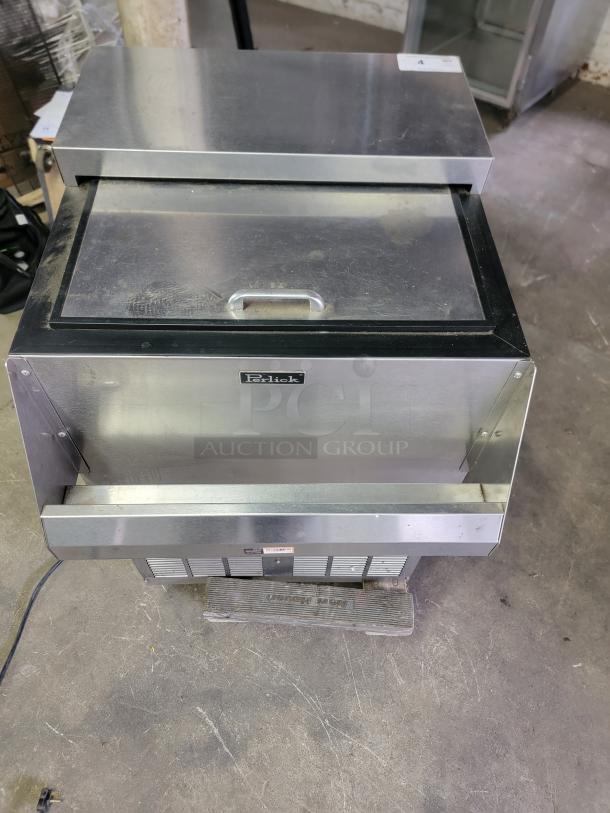 Perlick FR24 glass froster/freezer in good condition with minor wear; durable stainless steel, ideal for chilling glasses.