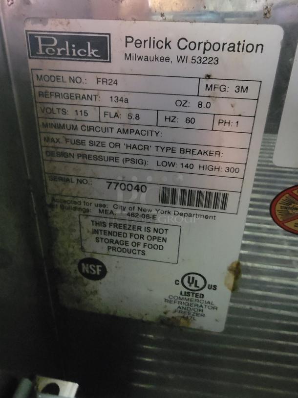 Perlick FR24 glass froster label showing model, power specs, and certification details. Some cosmetic wear visible.
