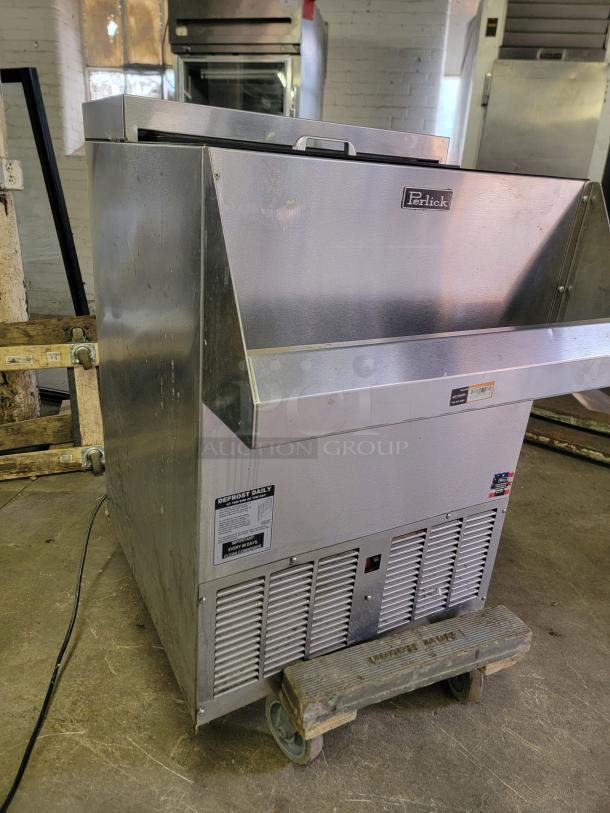 Perlick FR24 glass froster in stainless steel, minor cosmetic wear, defrost label visible, great working condition.