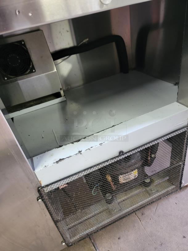 Cooltech CUST60BA commercial refrigerated prep table, stainless steel top, refrigerated base. Visible wear, functional condition.