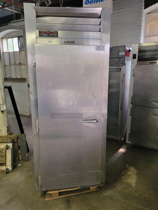 Traulsen RPP132L-FHS single door roll-in dough proofer in stainless steel, ideal for bakeries. Visible digital controls and branding.