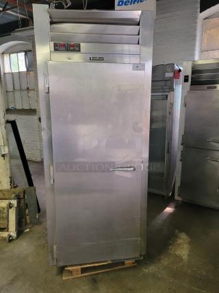 Traulsen RPP132L-FHS single door roll-in dough proofer in stainless steel, ideal for bakeries. Visible digital controls and branding.